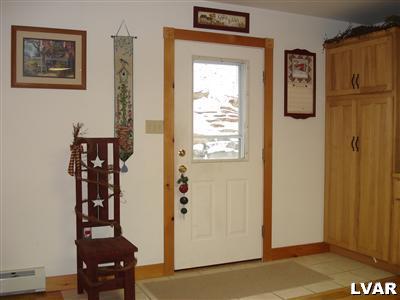 500 Point Phillips Road Bath, PA 18014 - Photo 8 of 31 a view of a hallway with wooden floor and door