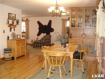 500 Point Phillips Road Bath, PA 18014 - Photo 10 of 31 a view of a dining room with furniture and chandelier