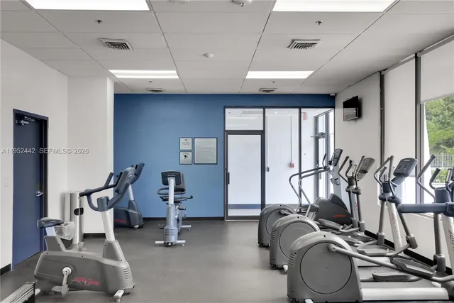 a view of a room with gym equipment