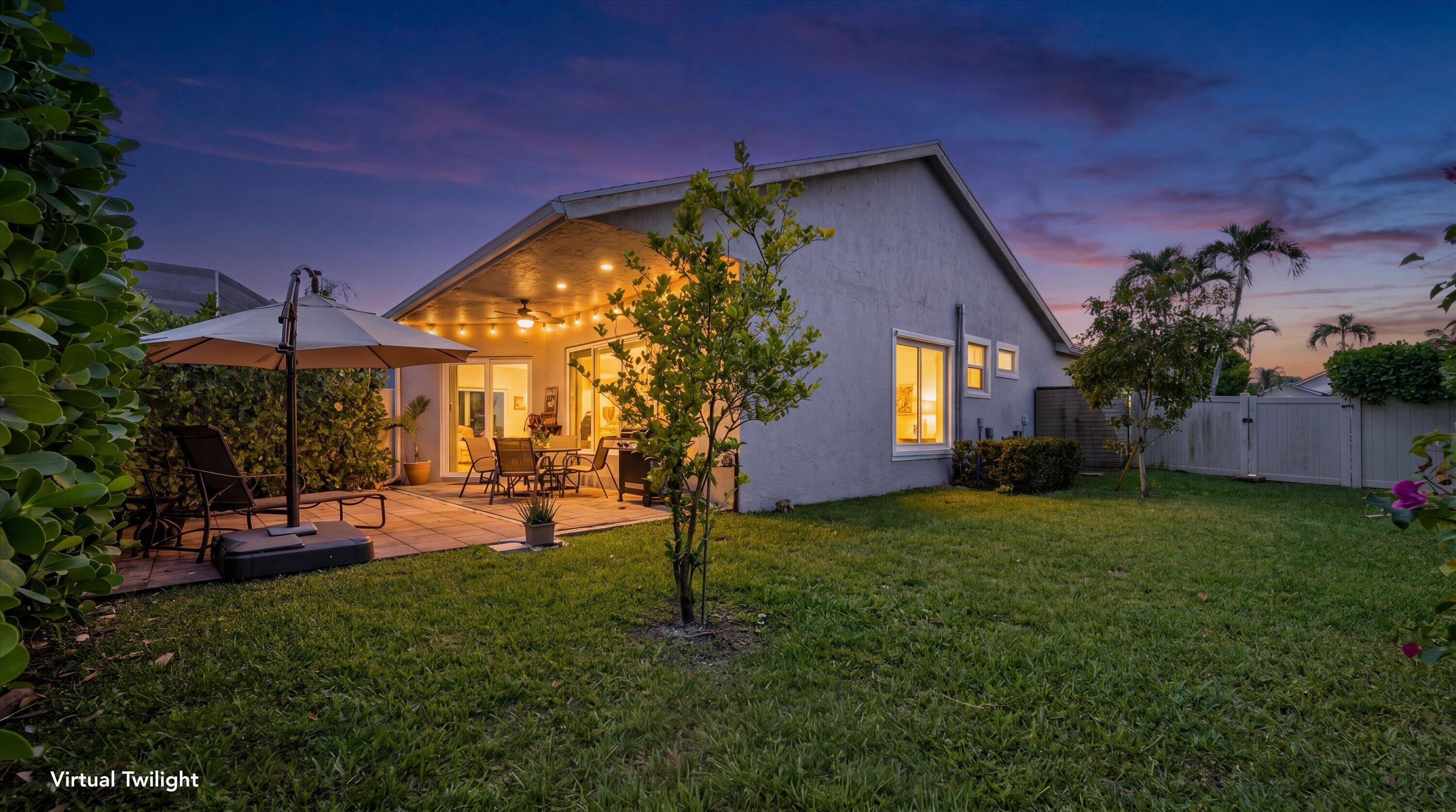 1110 Aviary Road Wellington, FL 33414 - Photo 42 of 51 twilight exterior back