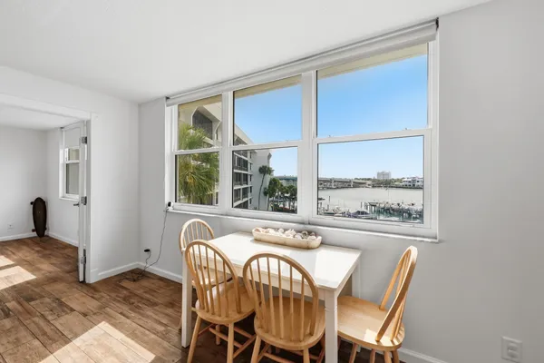 a view of a dining room with furniture window and outside view