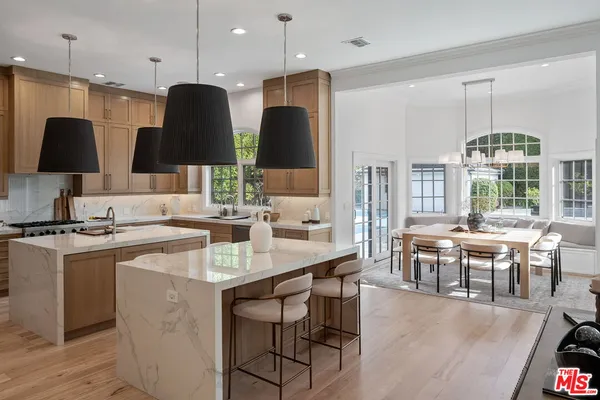 a bedroom with a bed and a desk