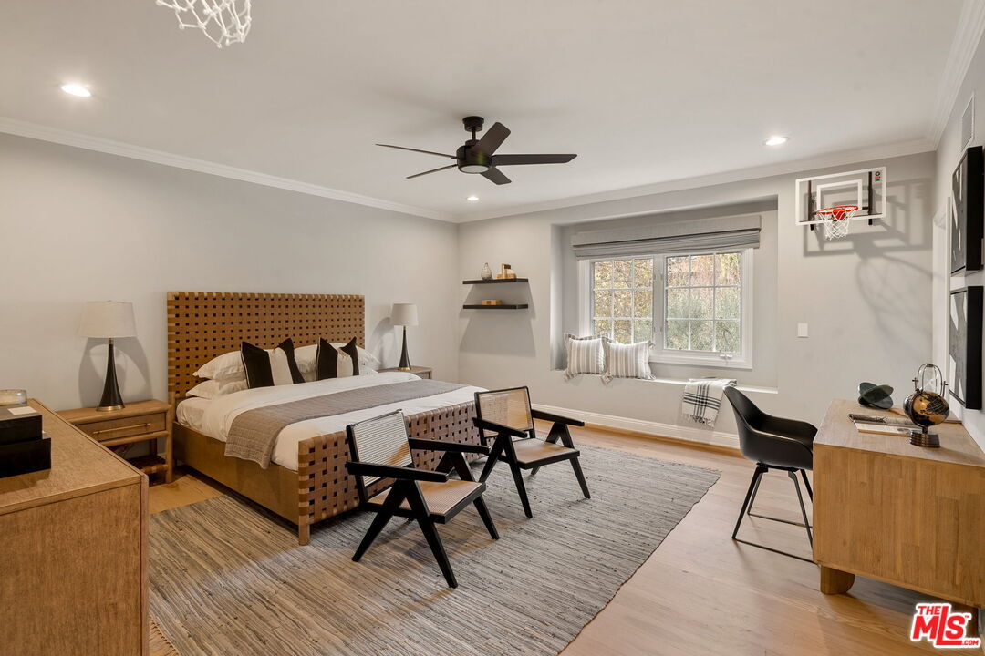 280 Homewood Road Los Angeles, CA 90049 - Photo 36 of 53 a bedroom with furniture and a window