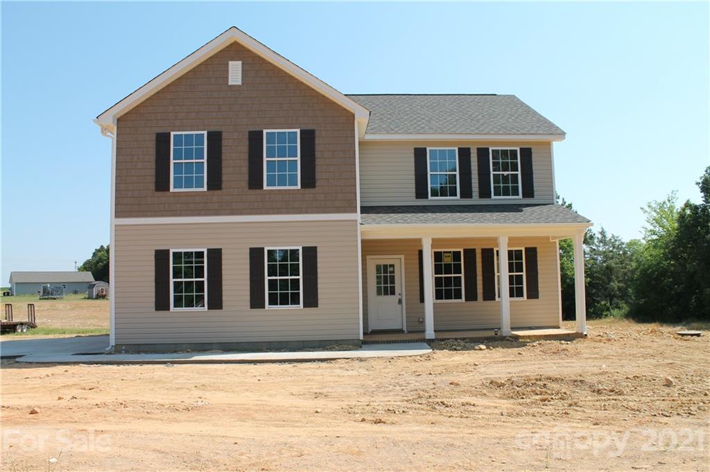 4813 Stack Road Monroe, NC 28112 - Photo 1 of 9 a front view of a house with a yard