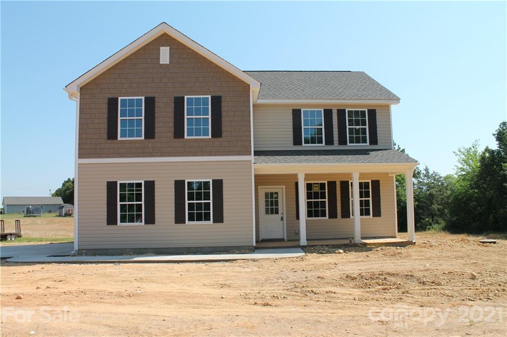 4813 Stack Road Monroe, NC 28112 - Photo 2 of 9 a front view of a house with a yard
