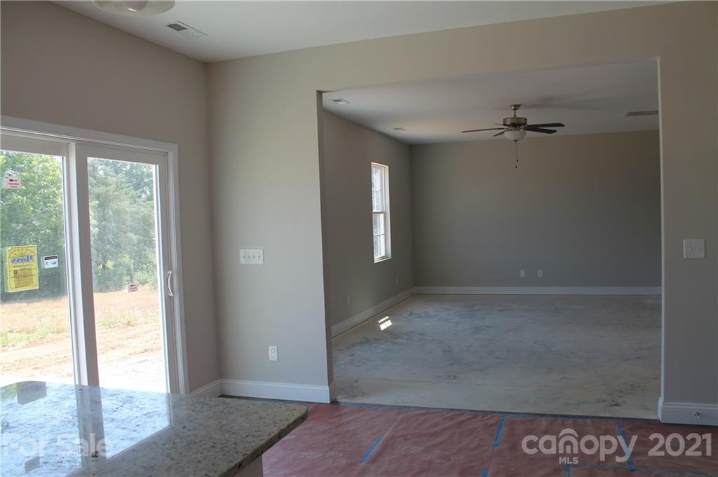 4813 Stack Road Monroe, NC 28112 - Photo 6 of 9 wooden floor in a hall with an entryway