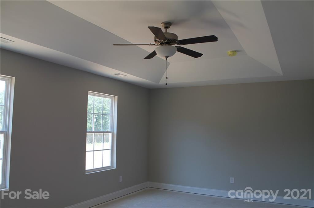 4813 Stack Road Monroe, NC 28112 - Photo 8 of 9 an empty room with windows