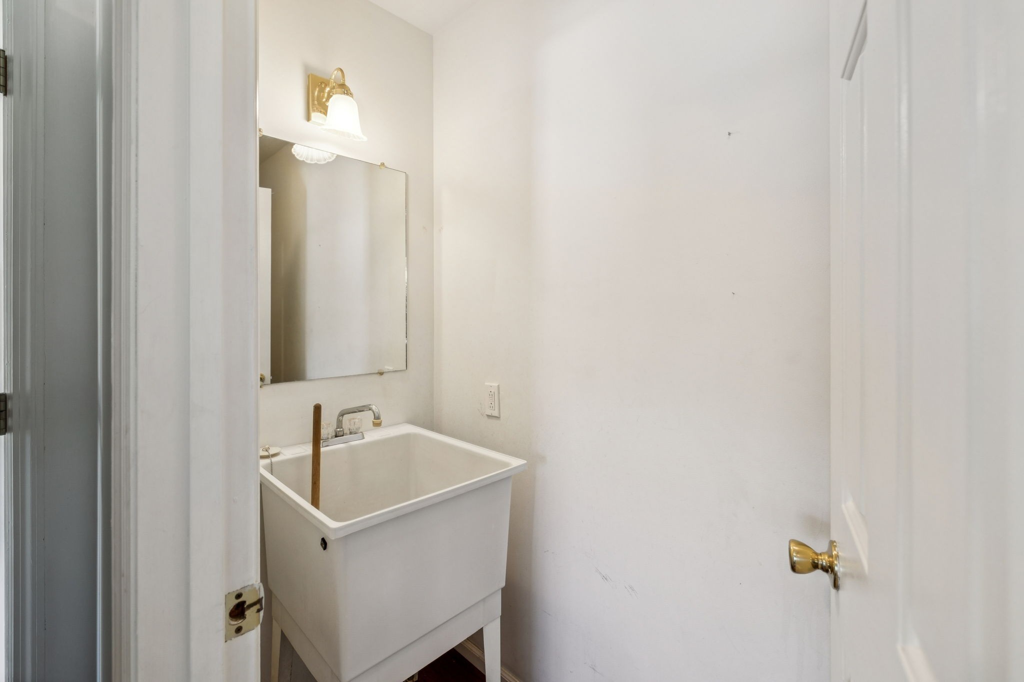 240 Hurst Road Hohenwald, TN 38462 - Photo 28 of 76 a bathroom with a sink and a mirror