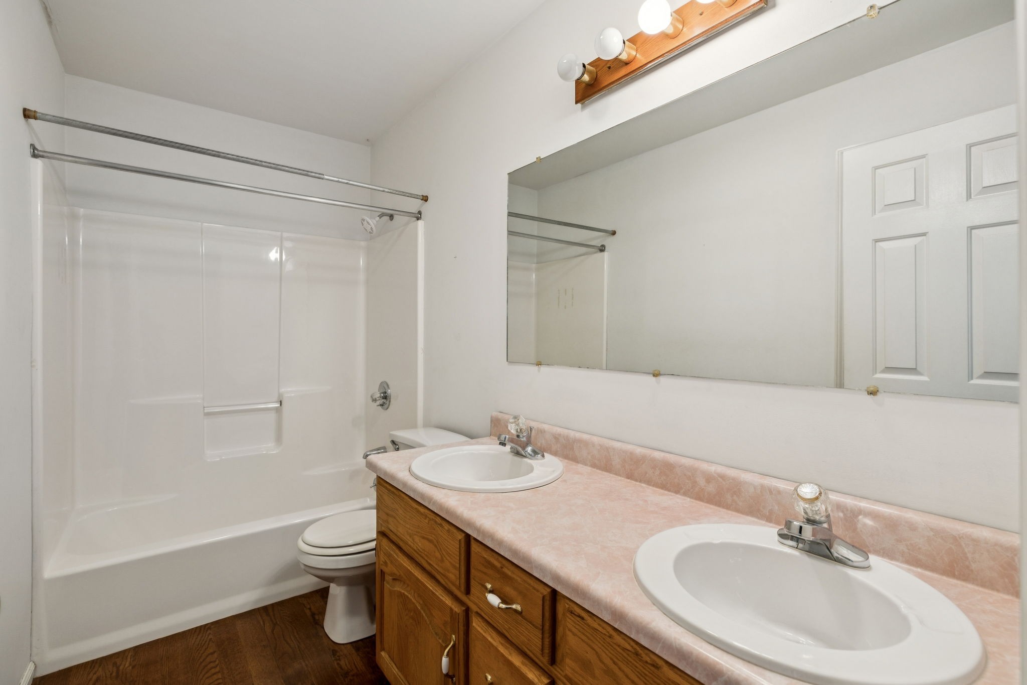 240 Hurst Road Hohenwald, TN 38462 - Photo 29 of 76 a bathroom with a sink a toilet a shower and a mirror