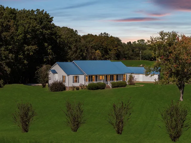 a view of a house with a big yard