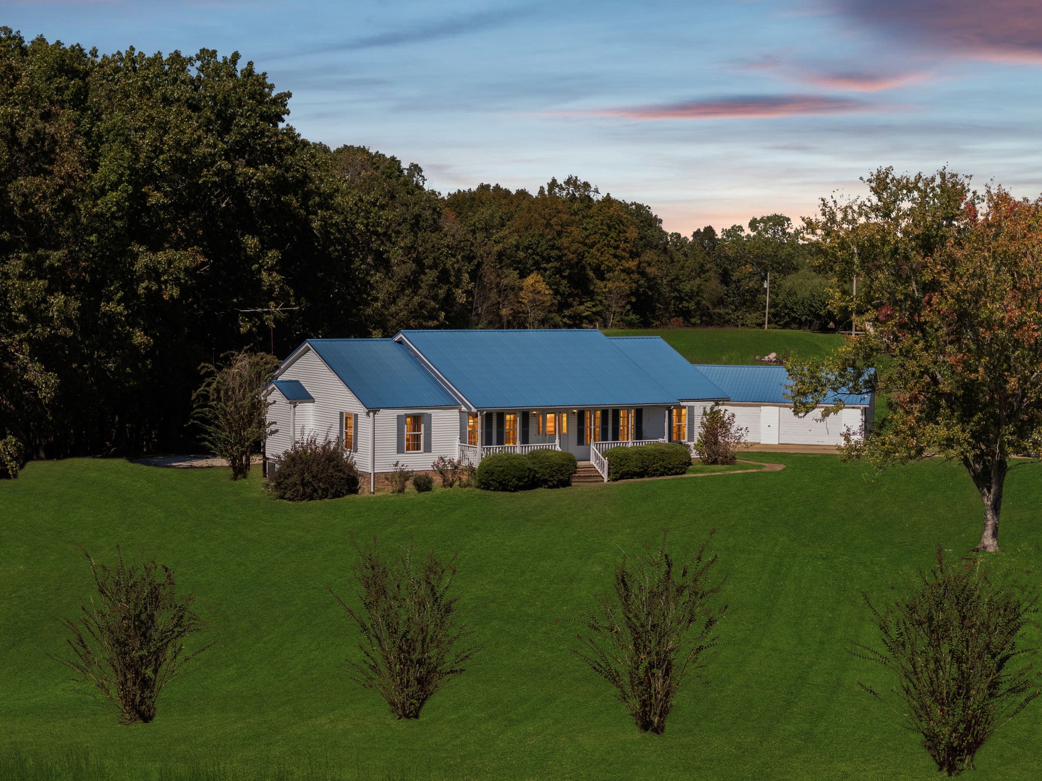 240 Hurst Road Hohenwald, TN 38462 - Photo 3 of 76 a view of a house with a big yard