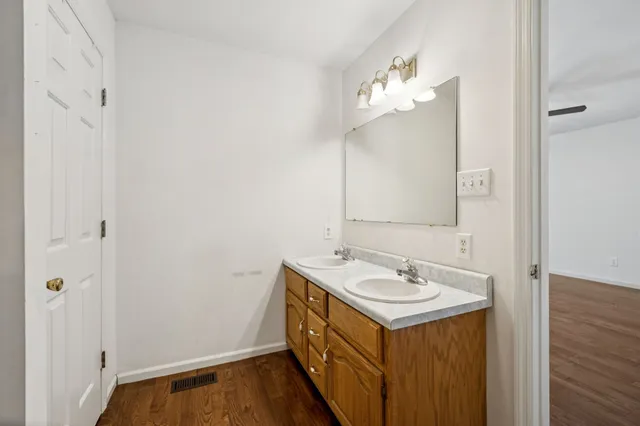 a view of a lake with a building in the background