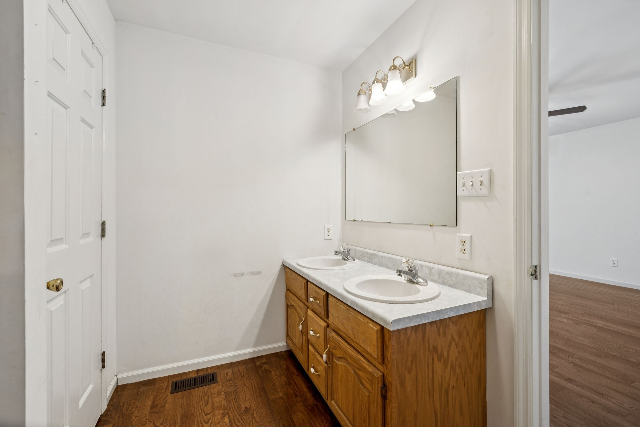 240 Hurst Road Hohenwald, TN 38462 - Photo 38 of 76 a bathroom with a sink a vanity and a mirror