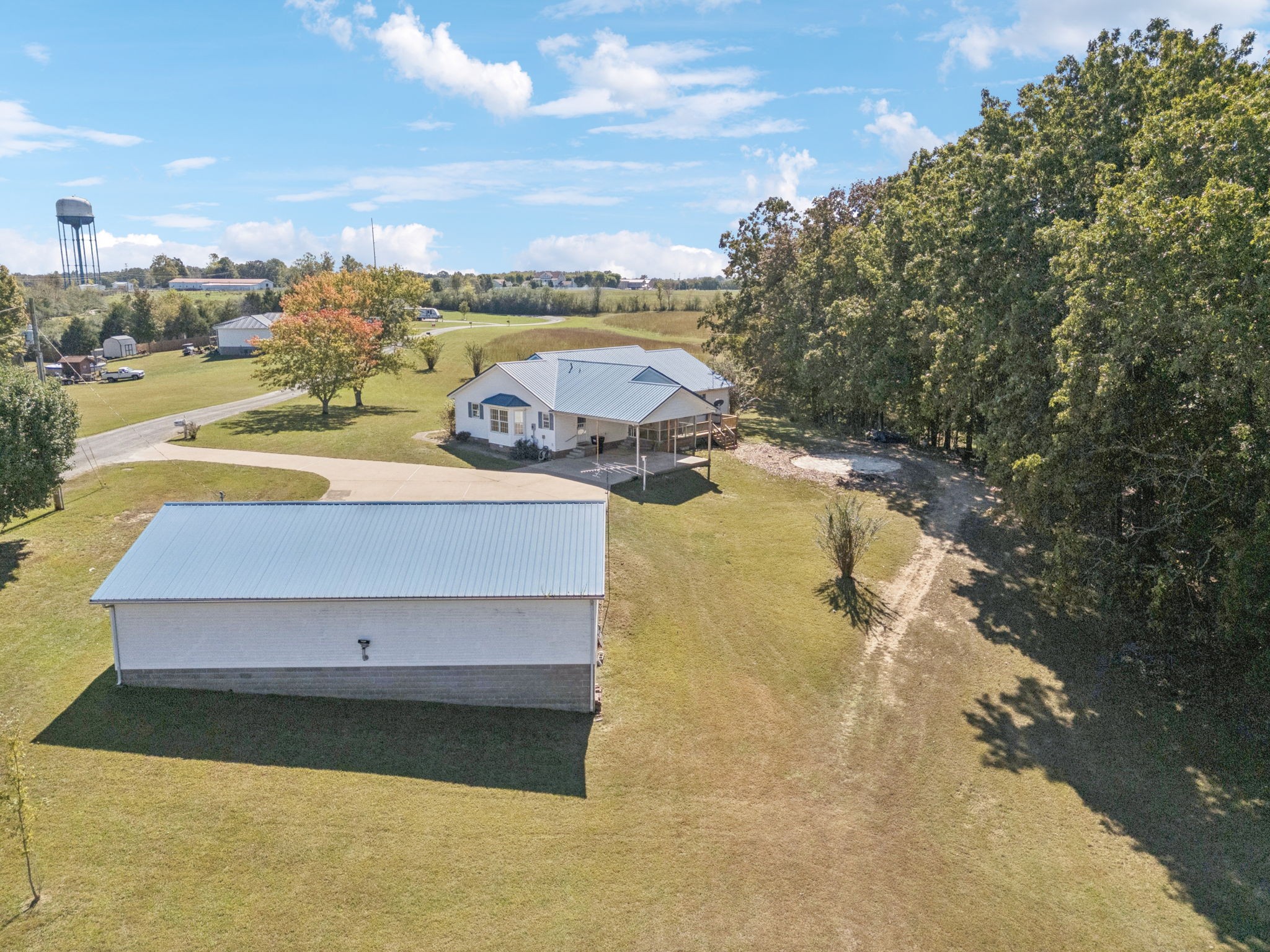 240 Hurst Road Hohenwald, TN 38462 - Photo 59 of 76 a view of a swimming pool with an ocean view