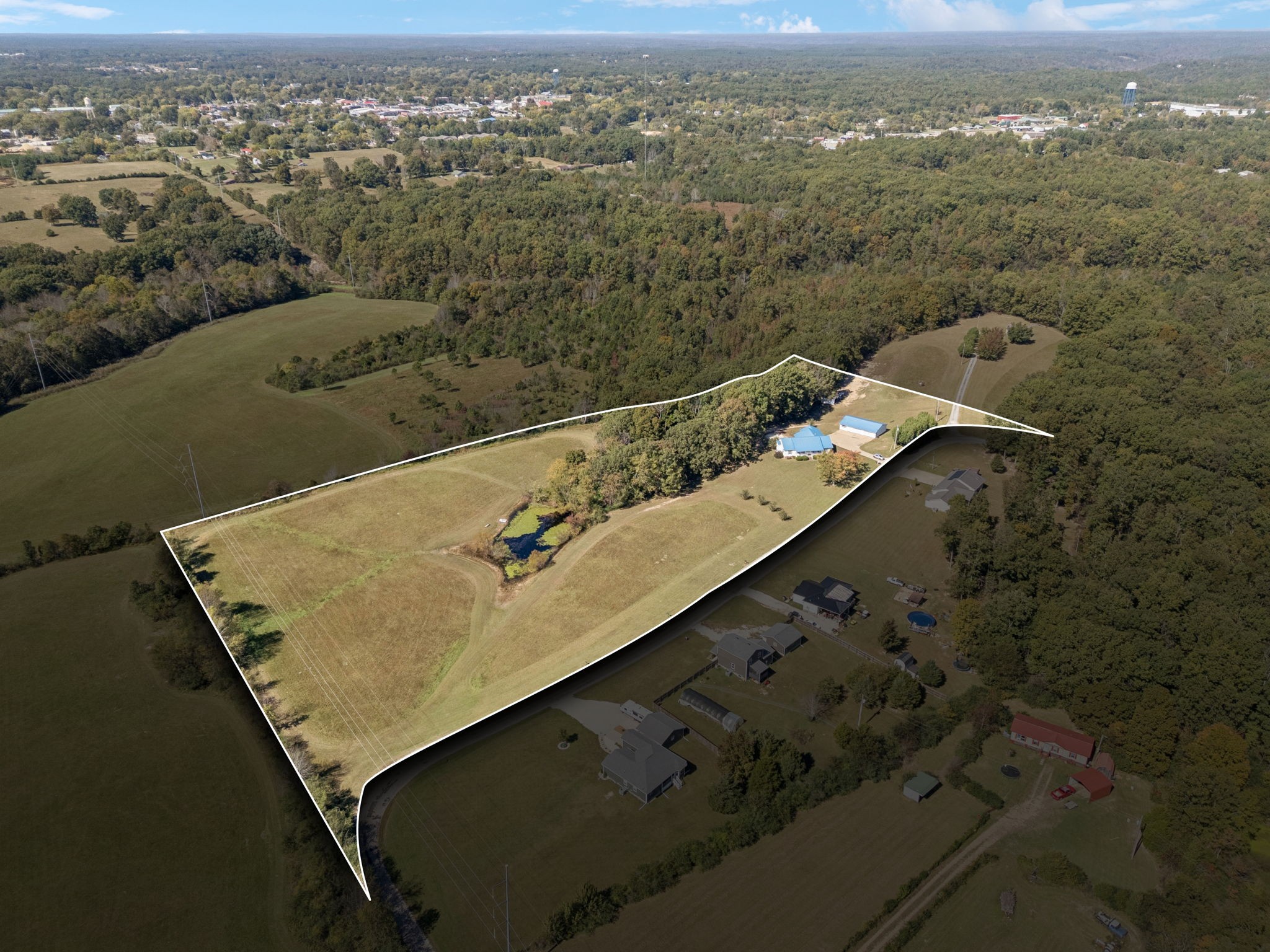 240 Hurst Road Hohenwald, TN 38462 - Photo 68 of 76 an aerial view of residential houses with outdoor space