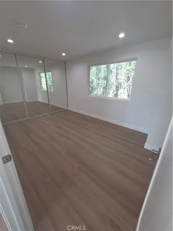 a view of a house with a barbeque