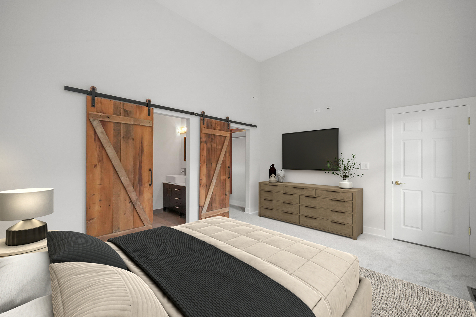 1026 West Monroe Street Chicago, IL 60607 - Photo 18 of 30 a bedroom with a bed and flat screen tv