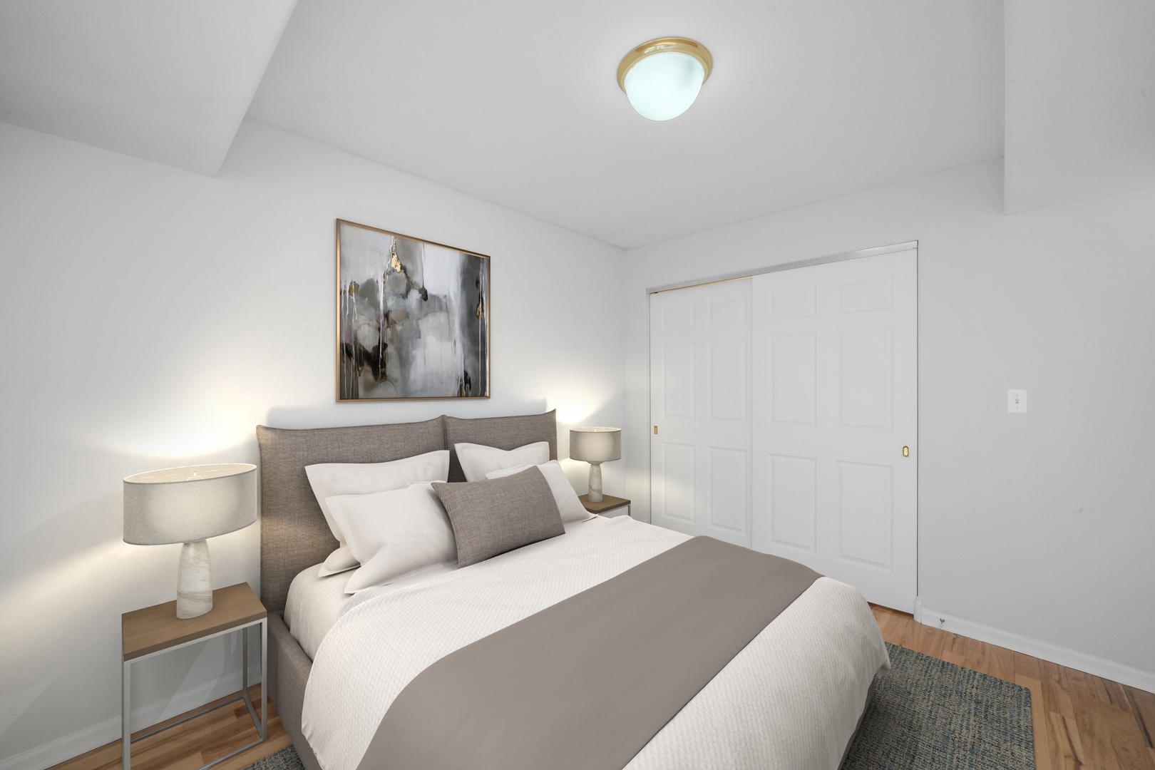 1026 West Monroe Street Chicago, IL 60607 - Photo 22 of 30 a bedroom with a bed and a lamp