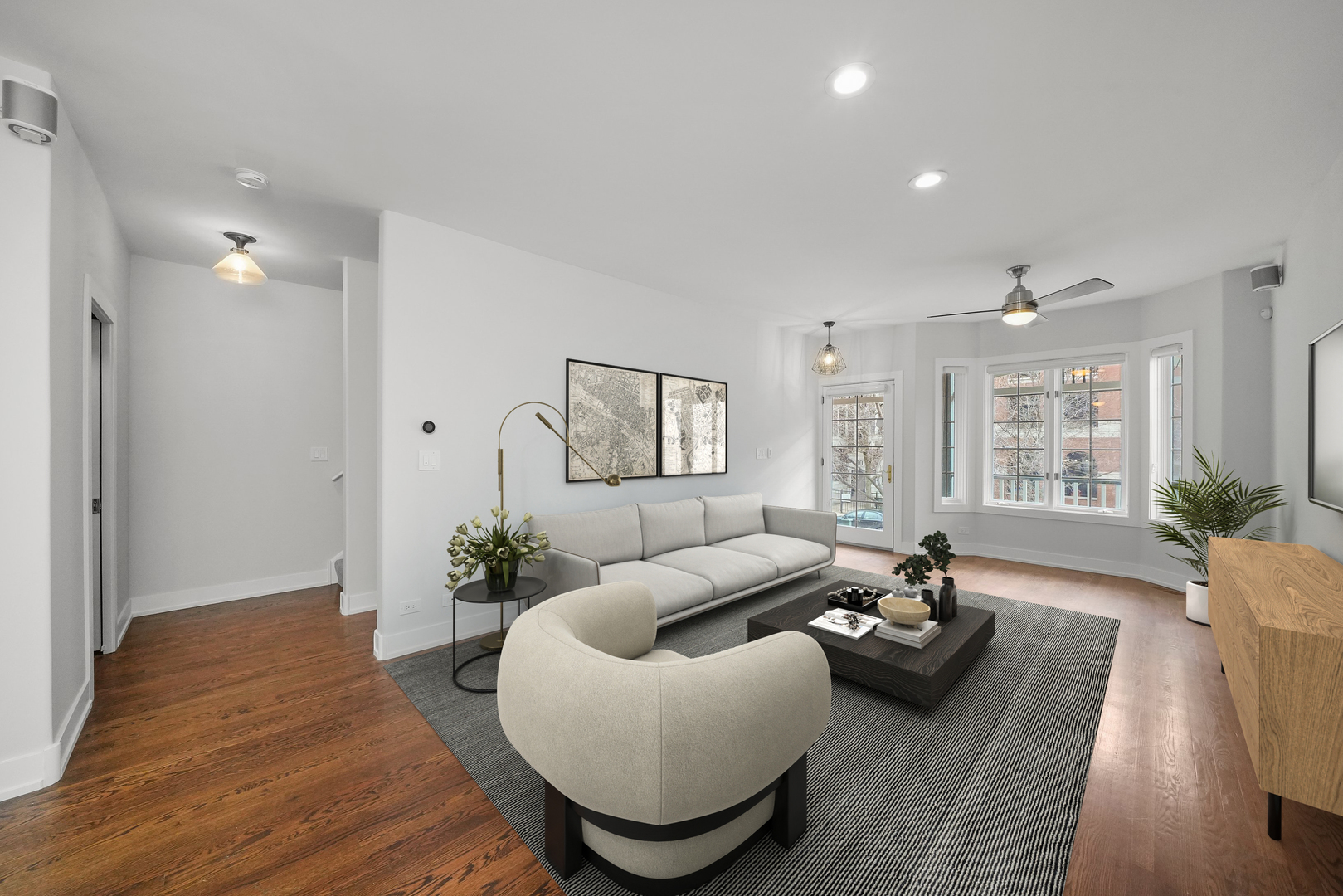 1026 West Monroe Street Chicago, IL 60607 - Photo 3 of 30 a living room with furniture rug and wooden floor