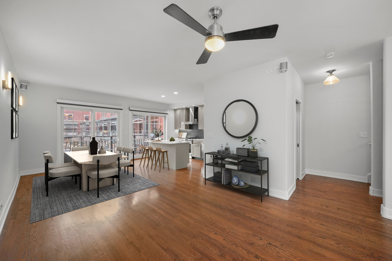 1026 West Monroe Street Chicago, IL 60607 - Photo 4 of 30 a living room with furniture a window and a clock