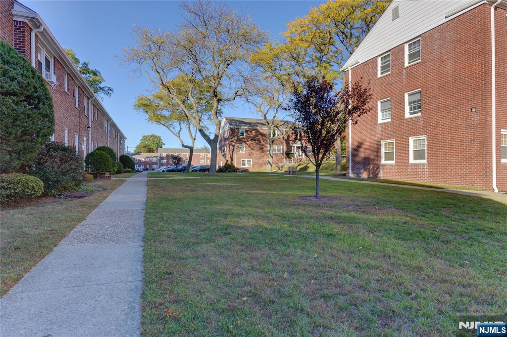 255 Bogert Road, Unit 2A River Edge, NJ 07661 - Photo 22 of 25 a view of a house with a yard
