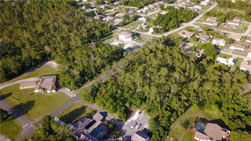 13860 Cooper Road Spring Hill, FL 34609 - Photo 1 of 1 an aerial view of a house