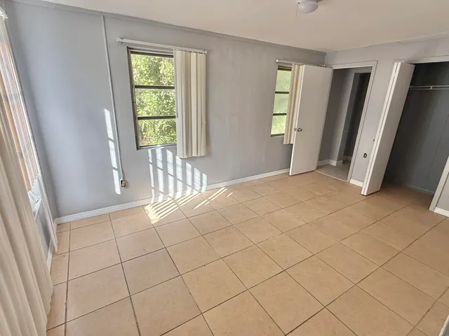 a view of an empty room and window