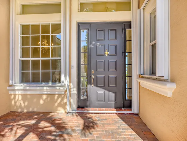 a view of a chairs and table in a patio