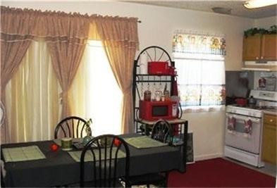 650 Raintree Path Alamo, TX 78516 - Photo 5 of 6 a view of a workspace with furniture and a window