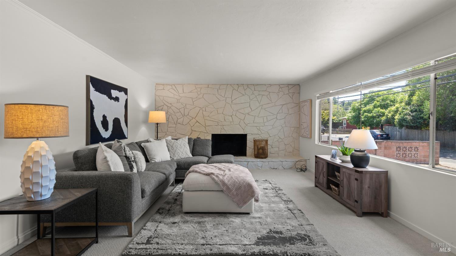 38 Bret Avenue San Rafael, CA 94901 - Photo 7 of 52 a living room with furniture fireplace and a large window