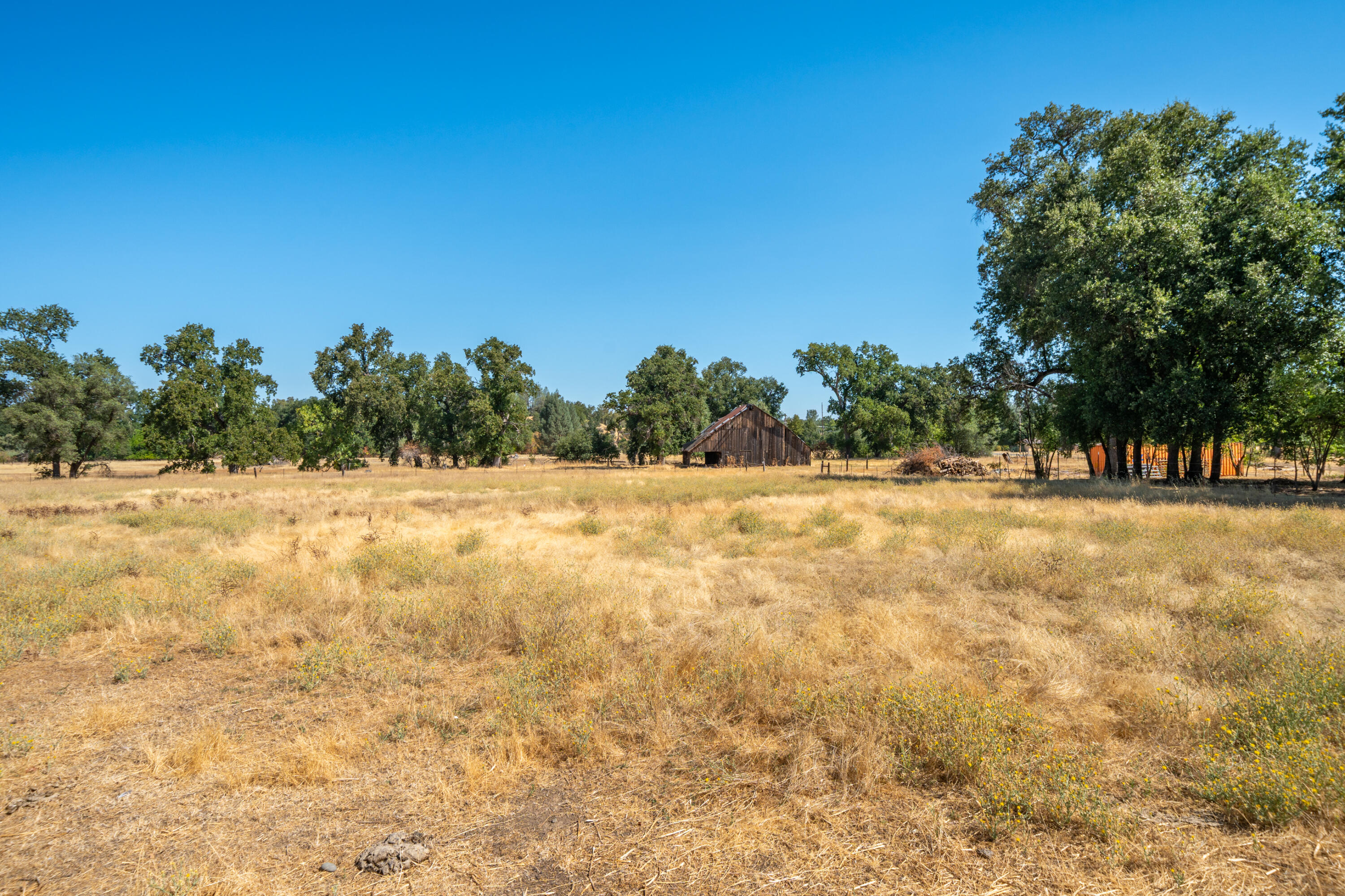 9422 Silver Bridge Road Palo Cedro, CA 96073 - Photo 12 of 27 a view of swimming pool with an outdoor space and seating area