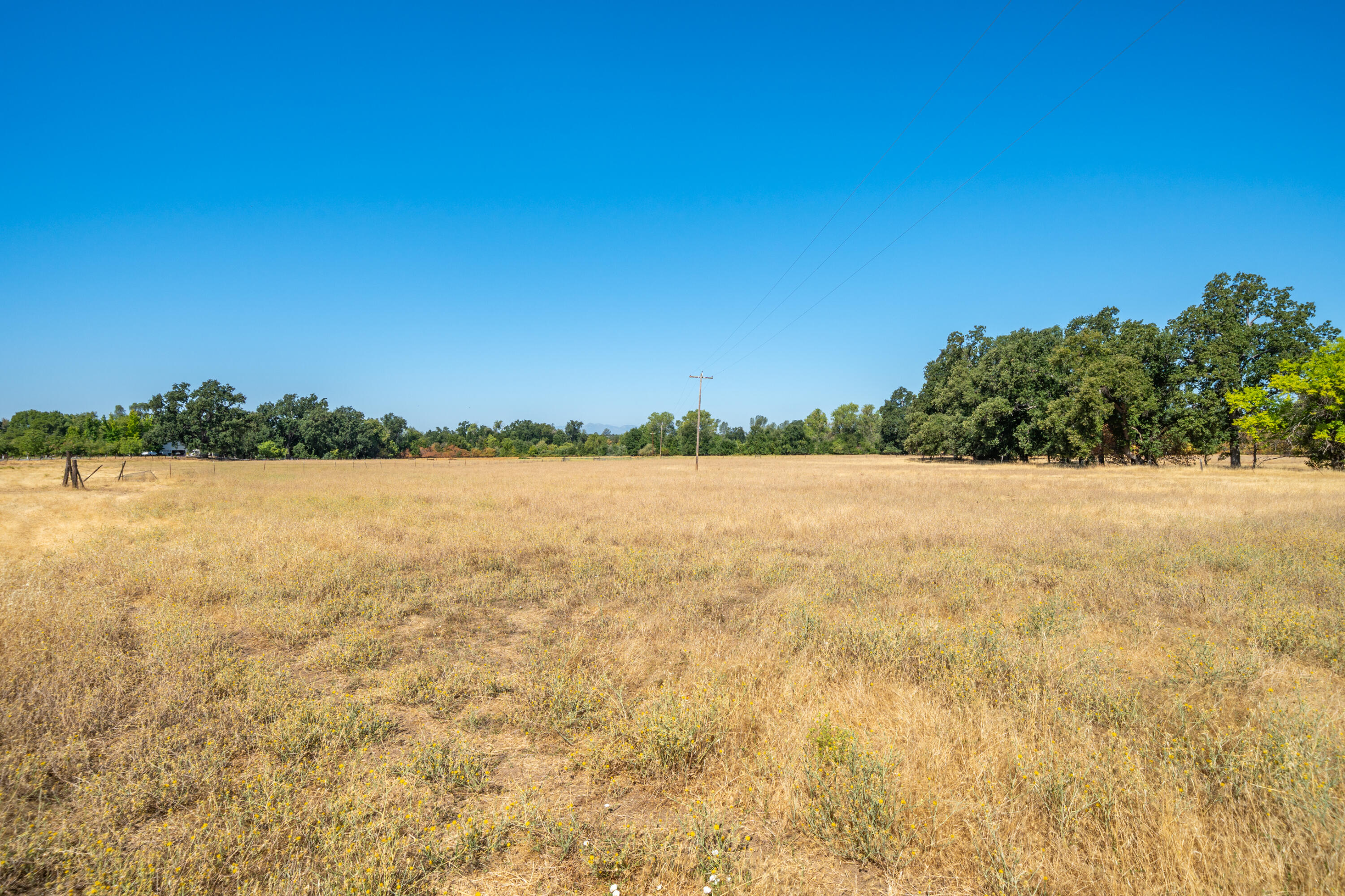 9422 Silver Bridge Road Palo Cedro, CA 96073 - Photo 19 of 27 a view of lake with sunset