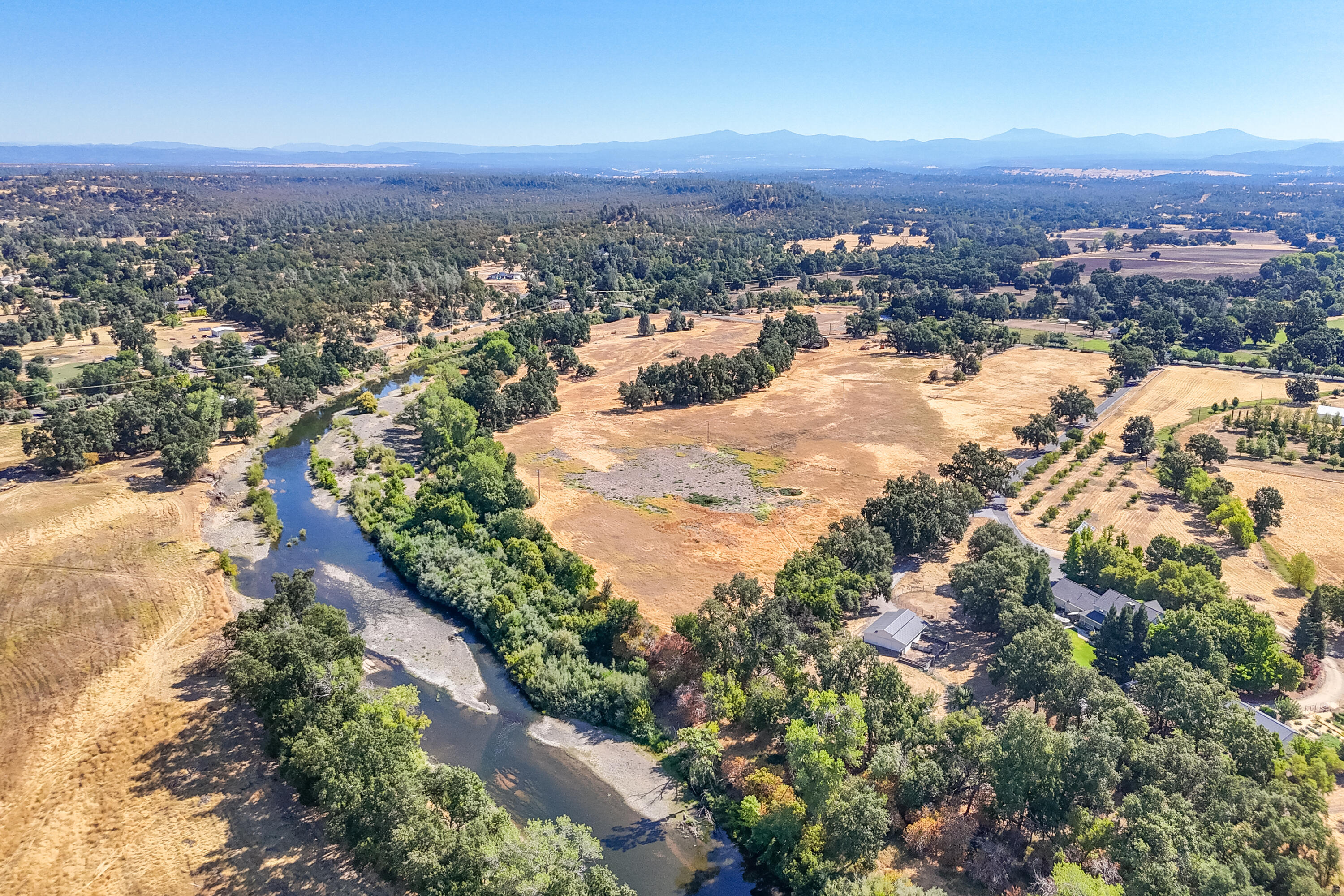9422 Silver Bridge Road Palo Cedro, CA 96073 - Photo 4 of 27 an aerial view of residential building and trees around