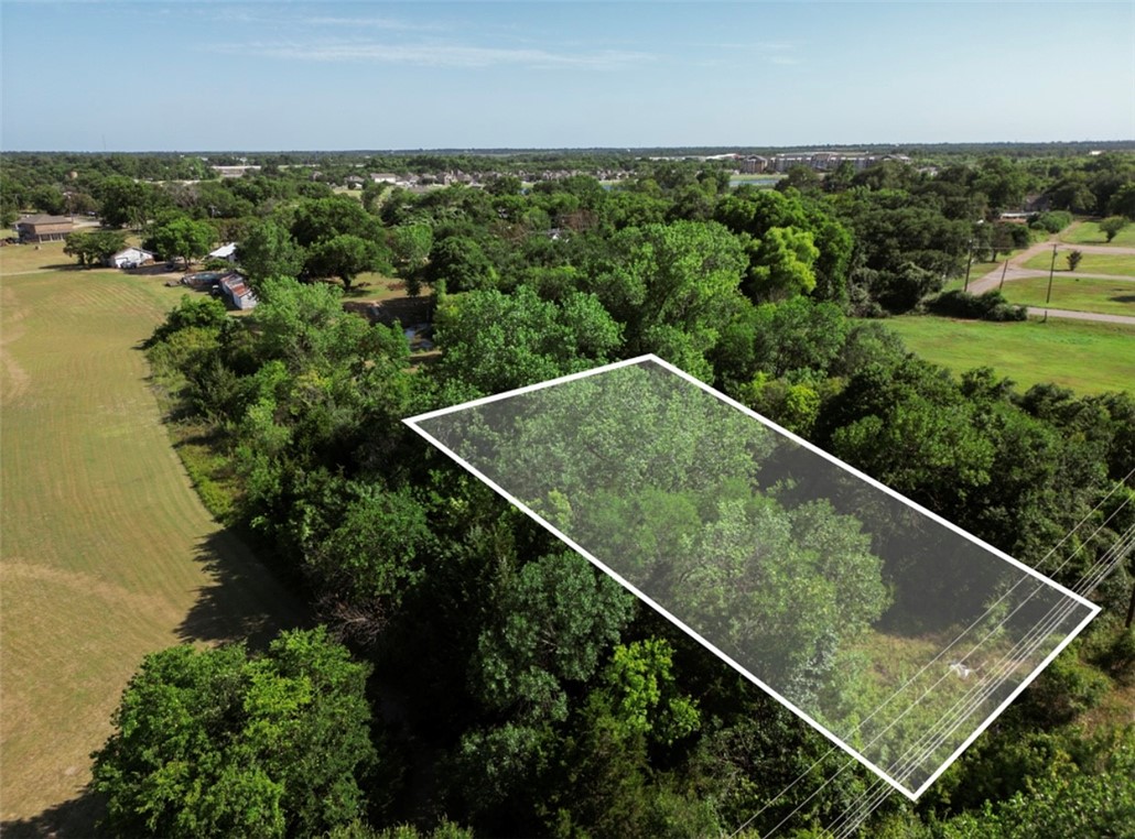 an aerial view of valley and swimming pool