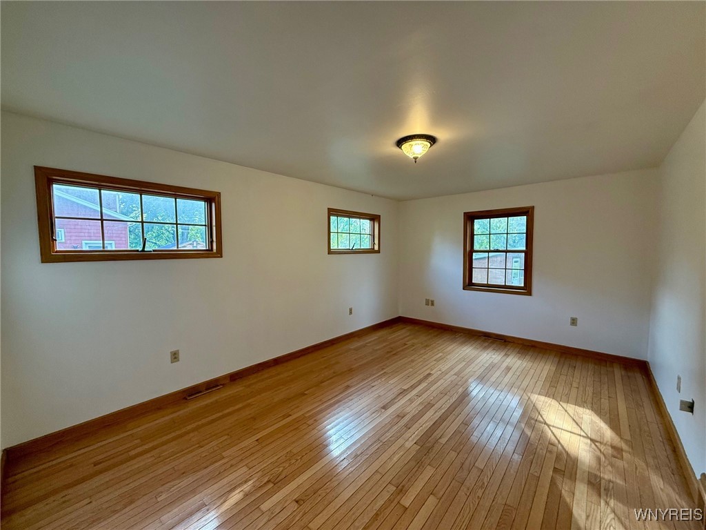 4628 Creek Rd Extension Lewiston, NY 14092 - Photo 22 of 39 The primary suite features abundant windows and gl