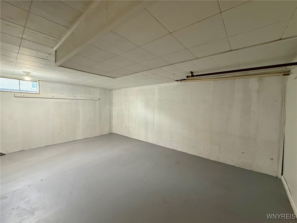 4628 Creek Rd Extension Lewiston, NY 14092 - Photo 33 of 39 The partially finished basement provides an open c