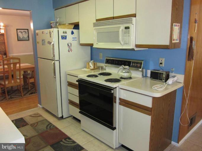 604 Lowander Lane Silver Spring, MD 20901 - Photo 13 of 30 Plenty of cabinet space in kitchen