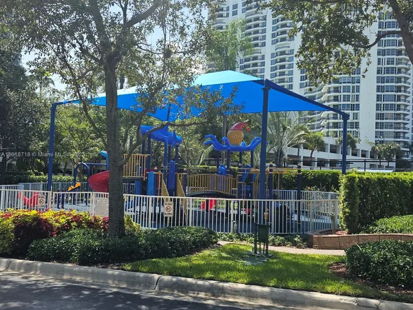 a view of a building with a swimming pool