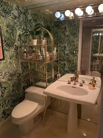 a bedroom with a bed and a television