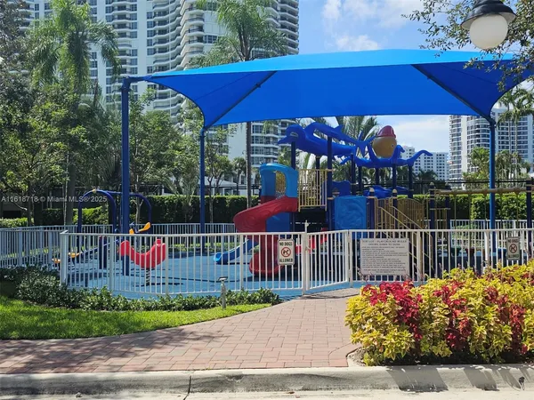 a view of a balcony with a flower garden