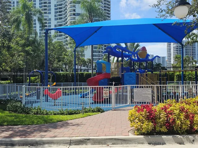 a view of a balcony with a flower garden
