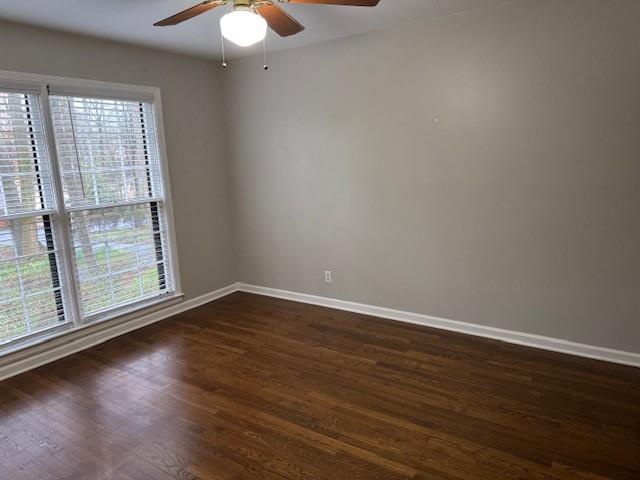 3324 Henderson Creek Road Atlanta, GA 30341 - Photo 12 of 29 a view of an empty room with wooden floor and a window