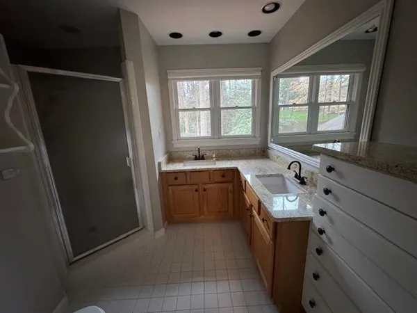 a kitchen with a sink stove and refrigerator