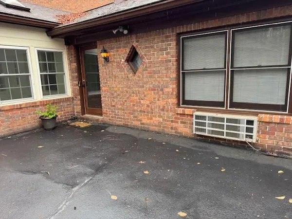 a front view of a house with a garage