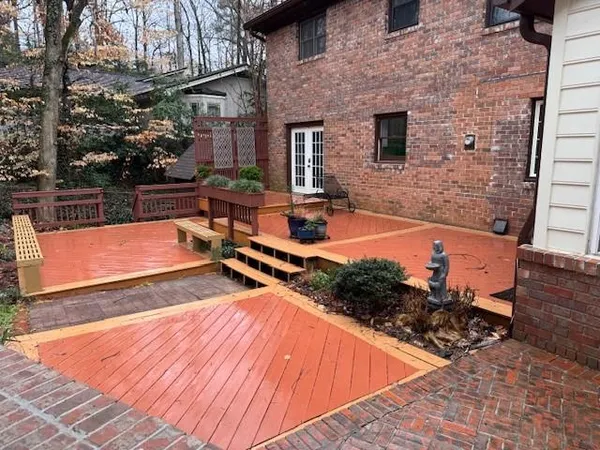 a view of swimming pool with outdoor seating
