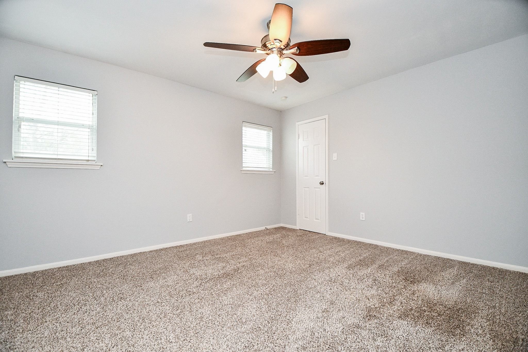 14011 Wickersham Lane Houston, TX 77077 - Photo 35 of 38 One of three spacious, secondary bedrooms.