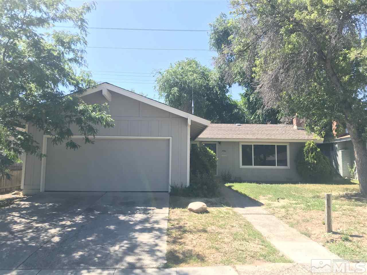 1480 Elizabeth Street Reno, NV 89509 - Photo 1 of 16 a view of a house with a yard
