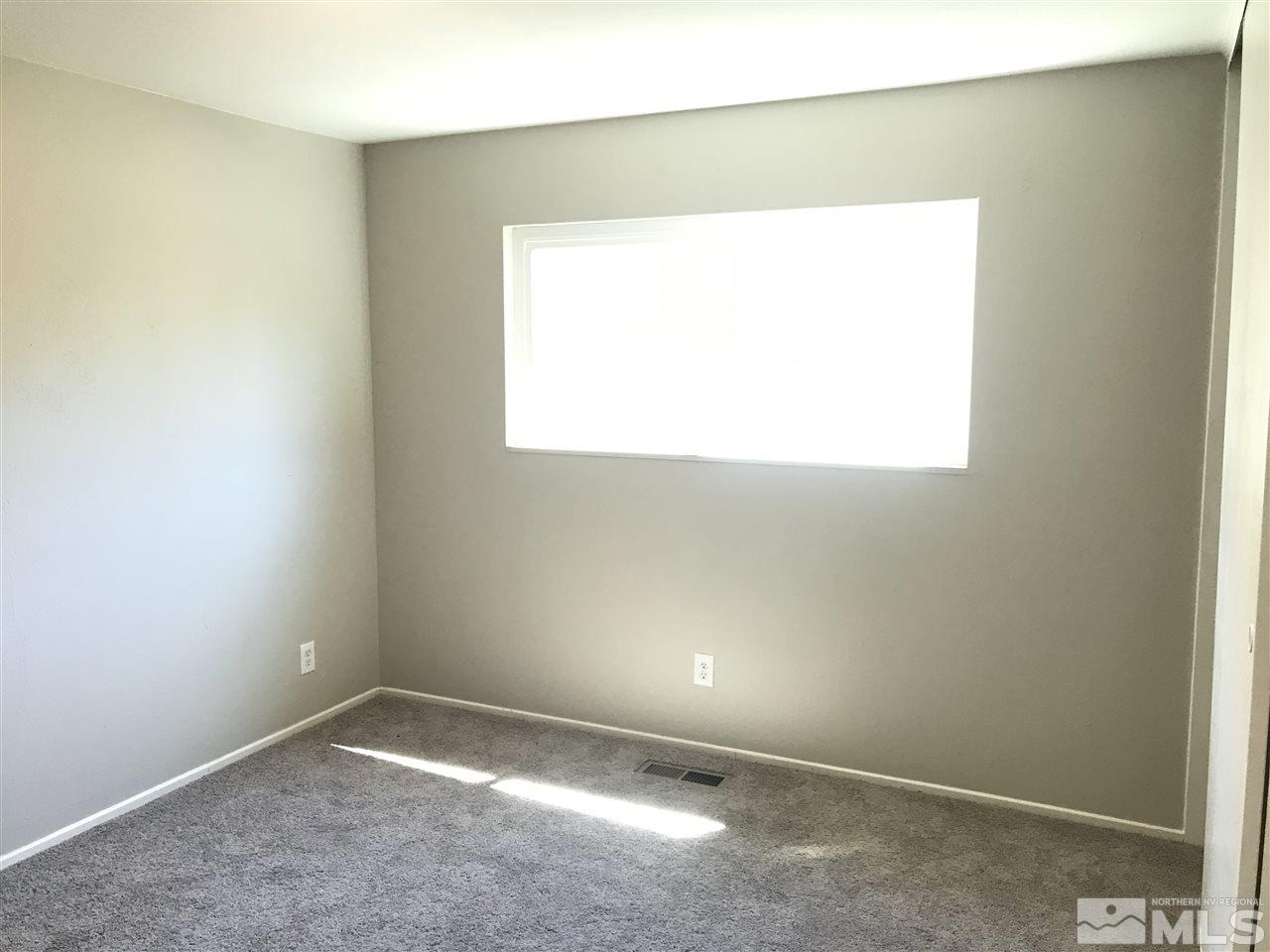 1480 Elizabeth Street Reno, NV 89509 - Photo 13 of 16 a view of an empty room with a window