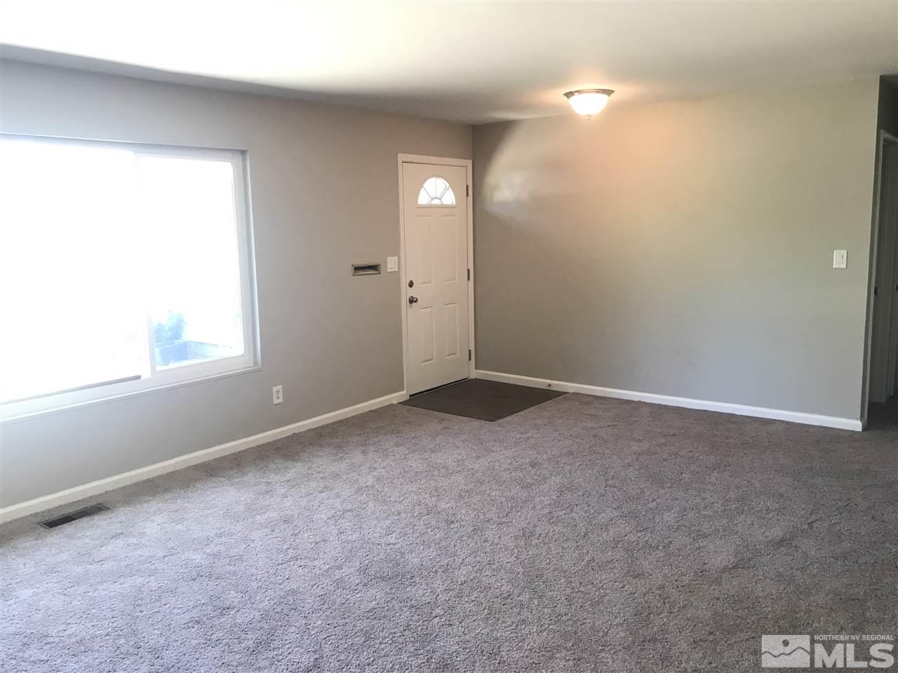 1480 Elizabeth Street Reno, NV 89509 - Photo 2 of 16 an empty room with a window