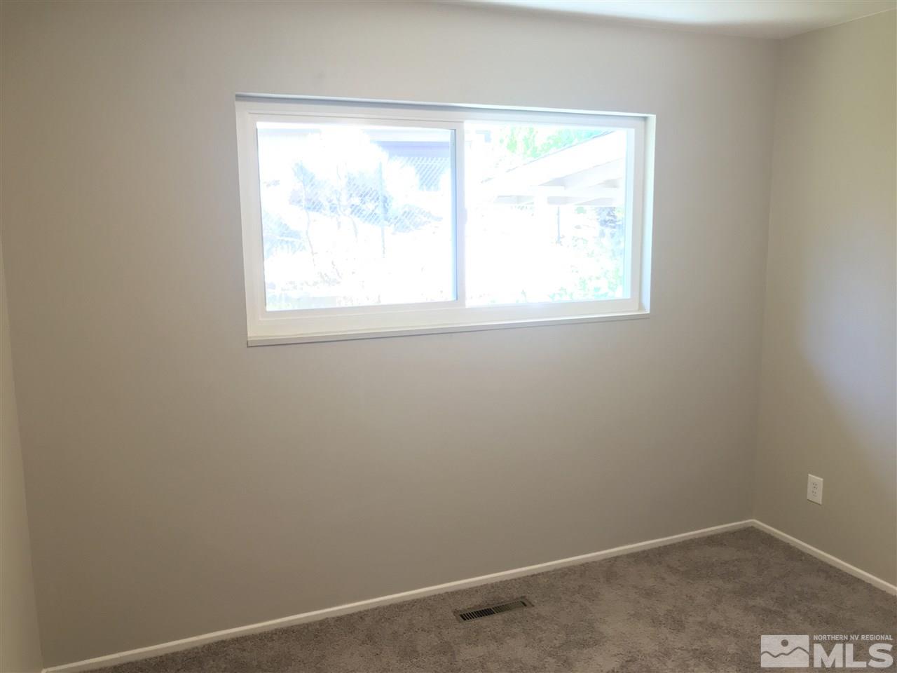 1480 Elizabeth Street Reno, NV 89509 - Photo 7 of 16 an empty room with a window